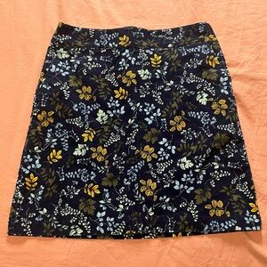 Talbots skirt, medium weight material, flowers on dark navy background. Size 8.